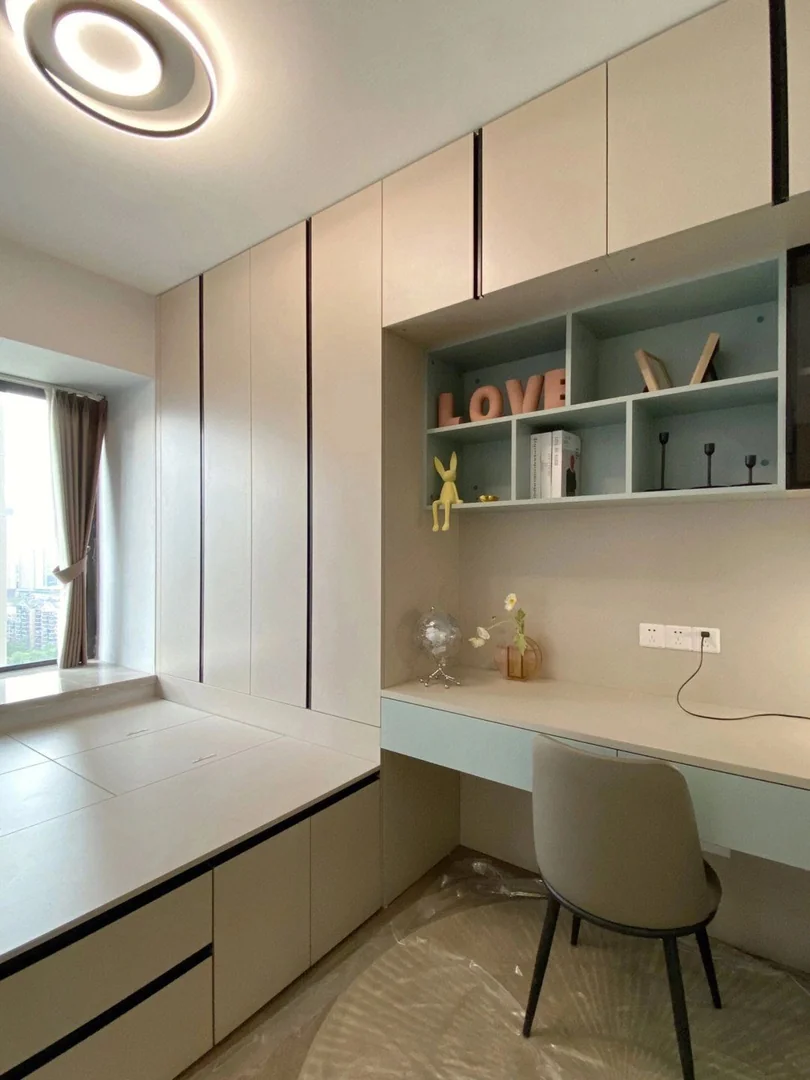 Bay window study table with wardrobe storage for a Singapore HDB bedroom