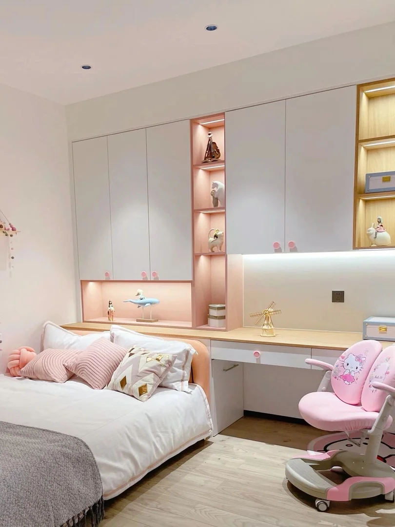 Kids bedroom wardrobe and study table built-in furniture in a Singapore HDB room