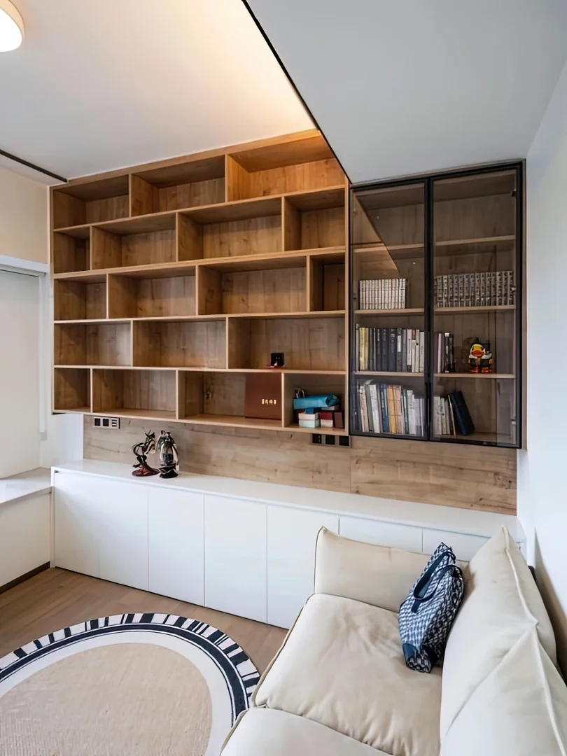 Living room wall panel and display cabinet design for a Singapore home