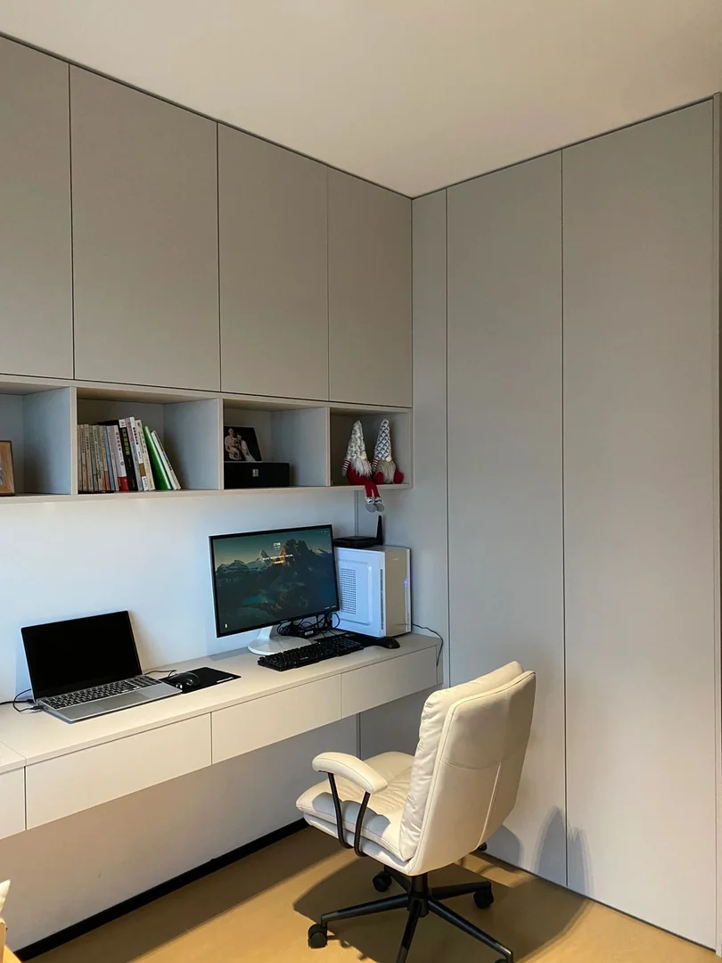 Custom study table with bookshelf storage in a Singapore HDB bedroom