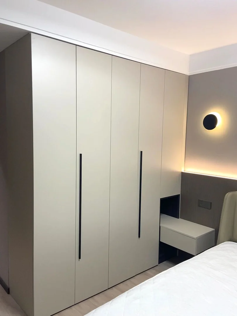 TV feature wall with electric fireplace niche in a Singapore HDB living room