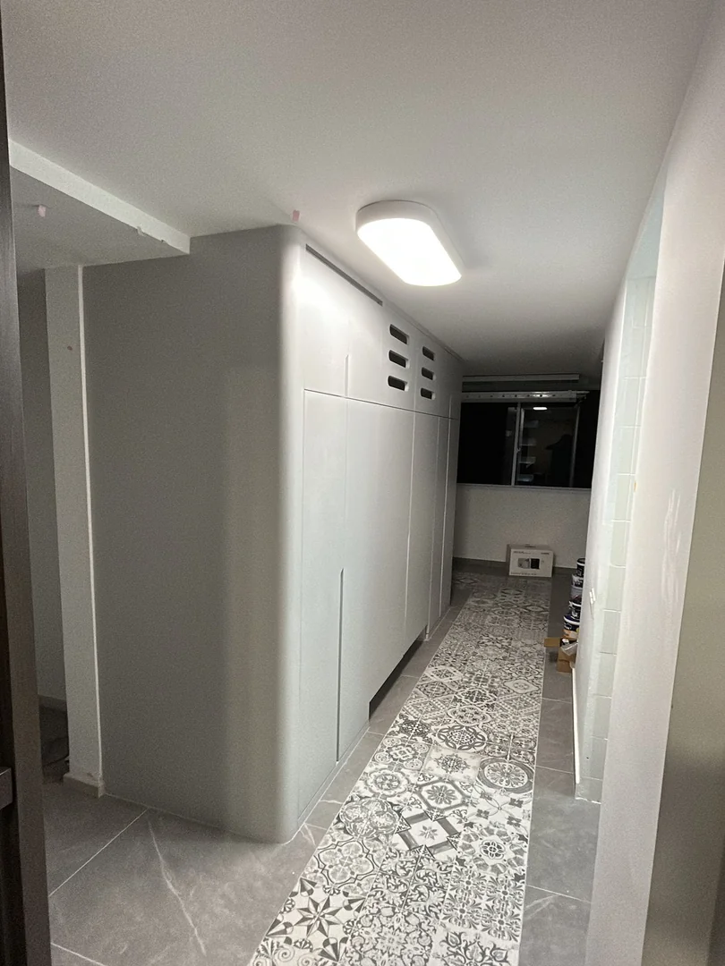 Custom corridor utility storage cabinet for a Singapore HDB home